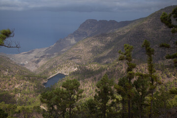 Fototapeta na wymiar Gran Canaria, landscape of the central montainous part of the island, Las Cumbres, ie The Summits, hiking route to Altavista, aboriginal name Azaenegue, mountain in Artenara municipality 