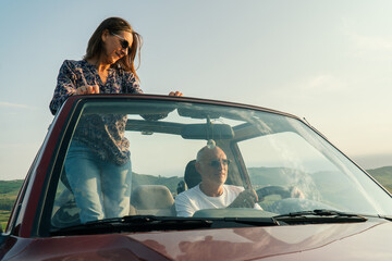 Aged couple enjoying their retirement holidays on the coast