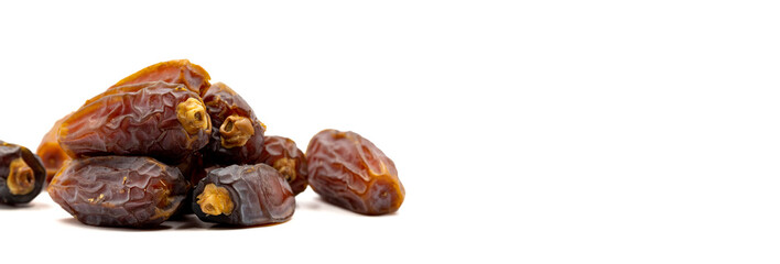 Date fruits on the white background. Fresh Medjool Dates for ramadan. Empty space for text. Copy space