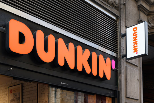 VALENCIA, SPAIN - NOVEMBER 15, 2021: Dunkin is an American multinational coffee and doughnut company