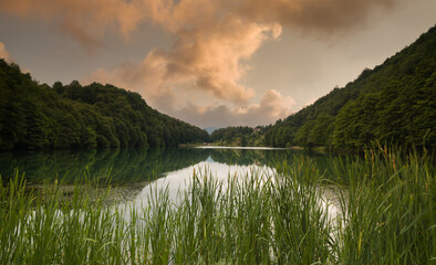 A calm lake at sunset