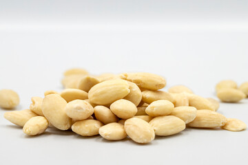 Peeled almond kernel isolated on white background. Snack fresh nuts. close up