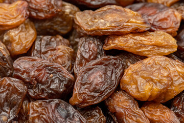 Close-up of dried raisins. food background. Snack fresh nuts. close-up nuts