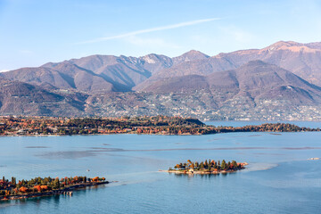 Lake Garda coastline and small Rabbit Island on a sunny autumn day