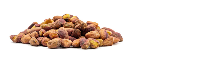 Pistachio kernel isolated on white background. food background. Snack fresh nuts. Empty space for text. Copy space