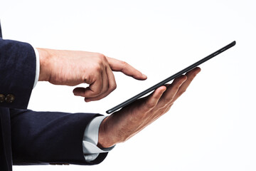 Man presses on the screen of a digital tablet, close up. Online technology concept