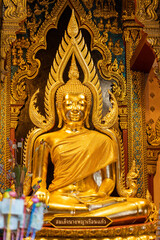 Phitsanulok, THAILAND - November 12, 2021: Somdet Nang Phaya Ruean Kaew is the name of the Buddha Statue in a chapel of Nang Phaya Temple, Phitsanulok province.