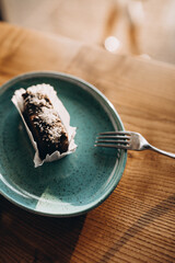 Delicious cupcake on a plate in cafe