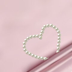 Festive background. Pearl heart on the fabric. Love, romance, Valentine's day. Textiles, beauty, fashion. eps 10