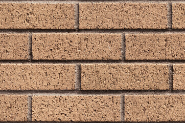 Repeating sandy brick wall texture typically found in developed areas, often seen around the backs of buildings. The file is a loop ready seamless texture file, allowing the picture to be tiled.