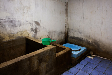 Decoration interior antique toilet and old restroom at Baan Huay Nam Sai rural countryside village...