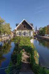 Fototapeta na wymiar France, Strasbourg, old buildings at riverside