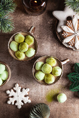 Cocoa with marshmallow and homemade gingerbread snowflakes.