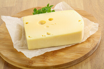 Maasdam cheese over the board