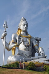 Majestic view of Shiva statue against the sky at Murdeshwar, India