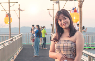 Portrait of a happy beautiful Asian young woman