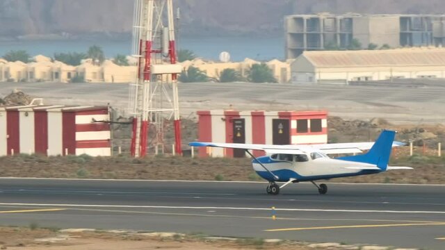 The takeoff of the most popular airplane in the history of aviation. Light single-engine airplane gaining altitude