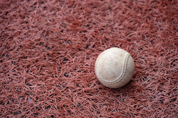 baseball ball on the ground