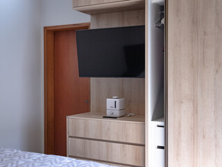 wardrobe with TV panel and shoe rack