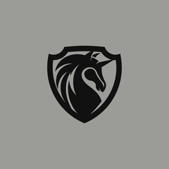 simple unicorn logo and shield. vector illustration for business logo or icon © gilar