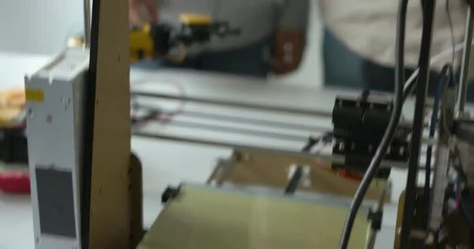 Students checking their 3D printed prototype