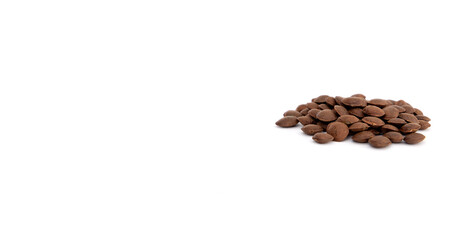 Naklejka premium Sacha Inchi roasted seed nuts, selective focus on front seeds, on white background