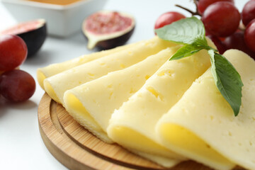 Concept of cooking eating with hard cheese, close up