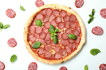 Concept of tasty food with Salami pizza on white background