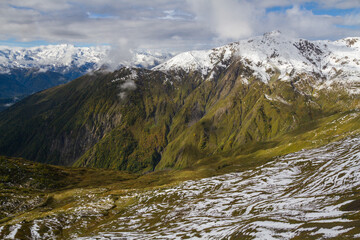 Fototapeta na wymiar The trail to Koruldi lakes from Mestia. Big Caucasus. First snow. Introvert's Paradise