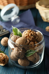 Concept of healthy food with walnuts on wooden background