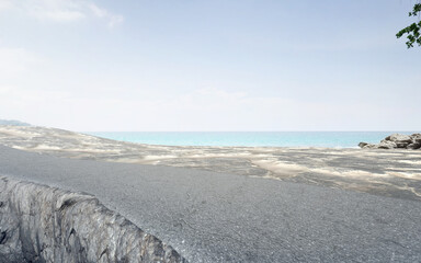 Empty asphalt floor for car park. 3d rendering of gray road with beach and sea view background.