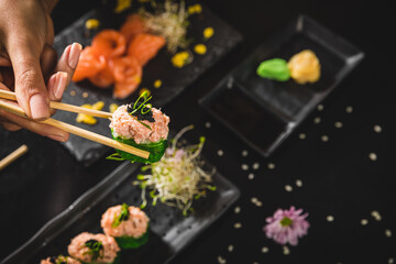 Obraz na płótnie Canvas Perfect Sushi Japanese Asian Seafood Food Dish Menu Gourmet Restaurant Chef on Dark Background