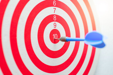 dartboard with arrow. creative concept idea for success with focus point on target to the winner in...