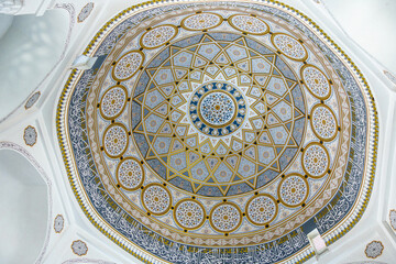 Patterned ornaments of vault of the mosque, made in Central Asian style. Inscriptions in circle are surahs from Koran in Arabic. Hakim At-Termezi Mosque (15 century), Termez, Uzbekistan