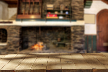 Desk of free space and home interior with fireplace 