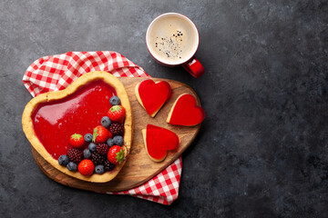 Heart shaped sweet cake with berries