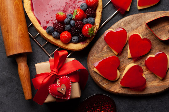 Heart shaped sweet cake with berries