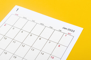 January 2022 calendar sheet on yellow background.