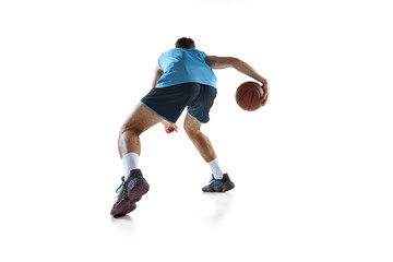 Fototapeta na wymiar Back view of professional basketball player in blue sports uniform training isolated on white studio background.