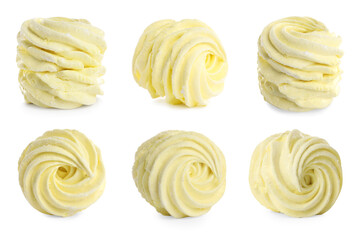 Set with tasty zephyrs on white background