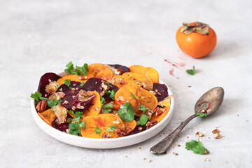 Winter salad of beets, persimmons, lemon and cilantro