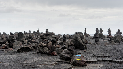 Lava rocks scattered across a volcanic field in La Réunion, showcasing the island’s rugged...