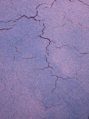 Cracks on a blue background. Blue texture of cracked wood.