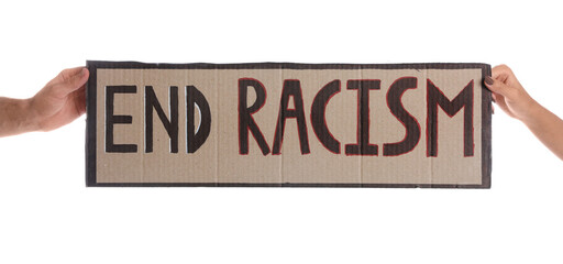Man and woman holding sign with phrase End Racism on white background, closeup