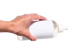 Hand with foam holding bottle with dish washing liquid, isolate