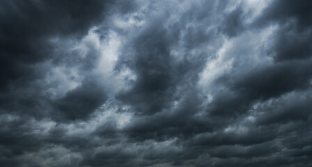 Naklejka na ściany i meble Dark clouds before a thunder-storm