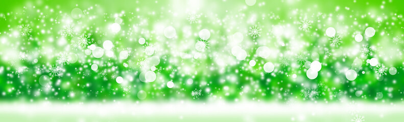 Wide Green snows bokeh blur background. Circle light on green wallpaper.