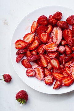 Sugar-coated sliced strawberries