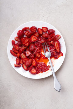 Sugar-coated sliced strawberries