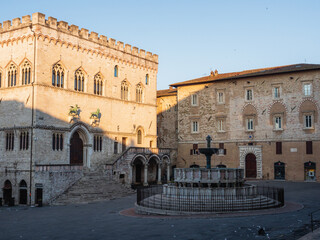 Piazza IV November in Perugia with Fontana Maggiore and Palazzo dei Consoli at sunrise, Perugia, Umbria, Italy
